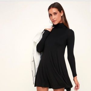 Black turtleneck swing dress